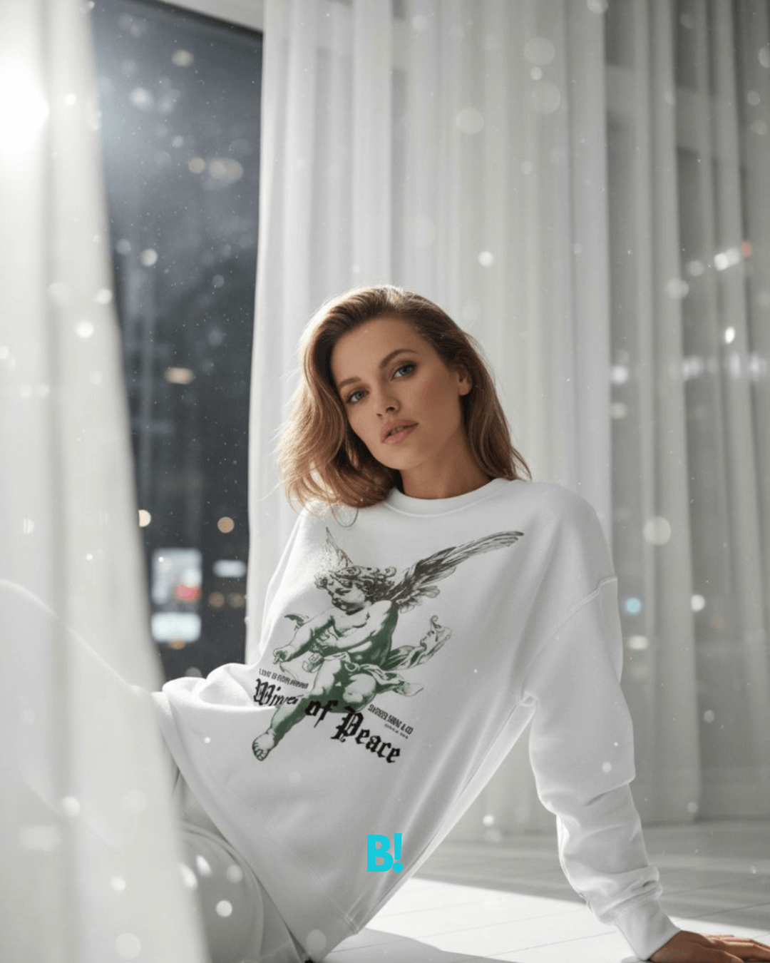Model wearing a cozy white binky comfywear sweater with 'Wings of Peace' design, perfect for relaxed style and free shipping.