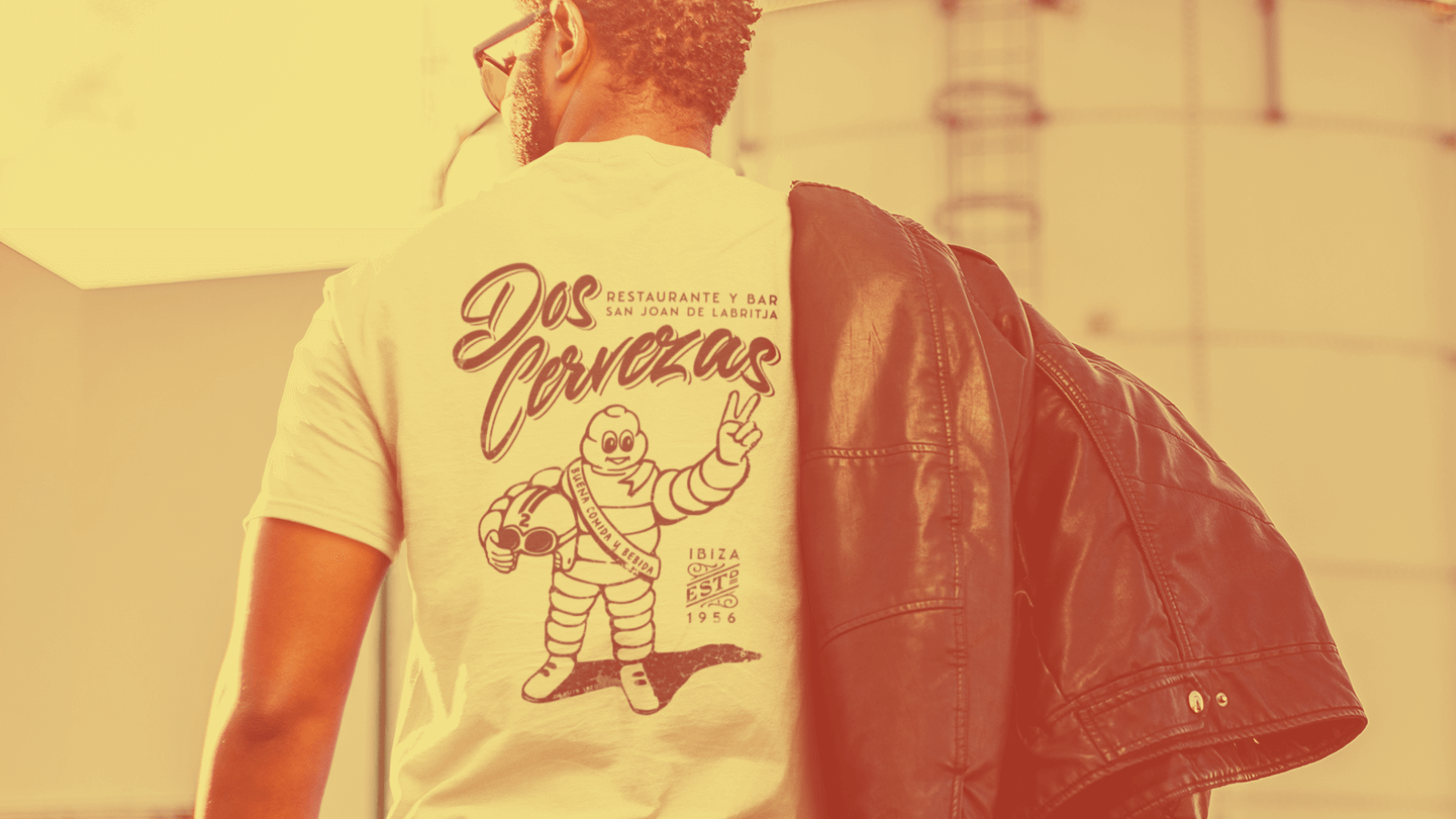 Man wearing a Dos Cervezas t-shirt, representing IBIZA’S BEST-KEPT SECRET! with a leather jacket.