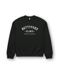 Betty Ford Clinic Heavy Sweater in black with Beverly Hills rehab logo, oversized unisex fit