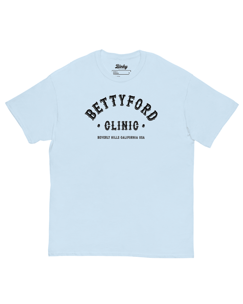 Betty Ford Clinic T-Shirt | Varsity Team featuring a retro graphic on a light blue tee from Binky comfywear.