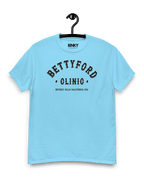 BETTY FORD CLINIC VARSITY T-SHIRT in light blue, featuring a vintage college design and relaxed unisex fit.