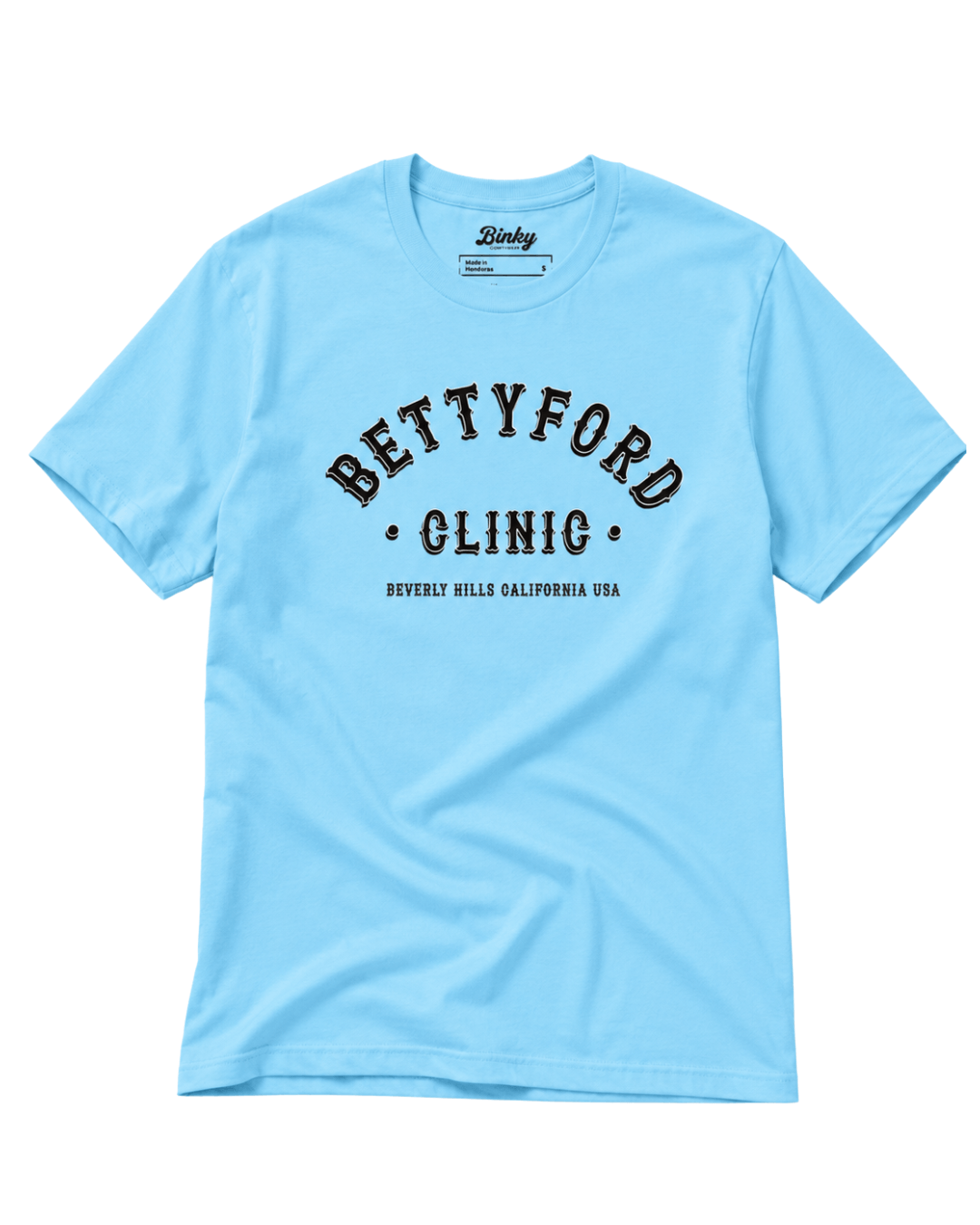 Betty Ford Clinic T-Shirt | Varsity Team in light blue with bold lettering and sporty design.