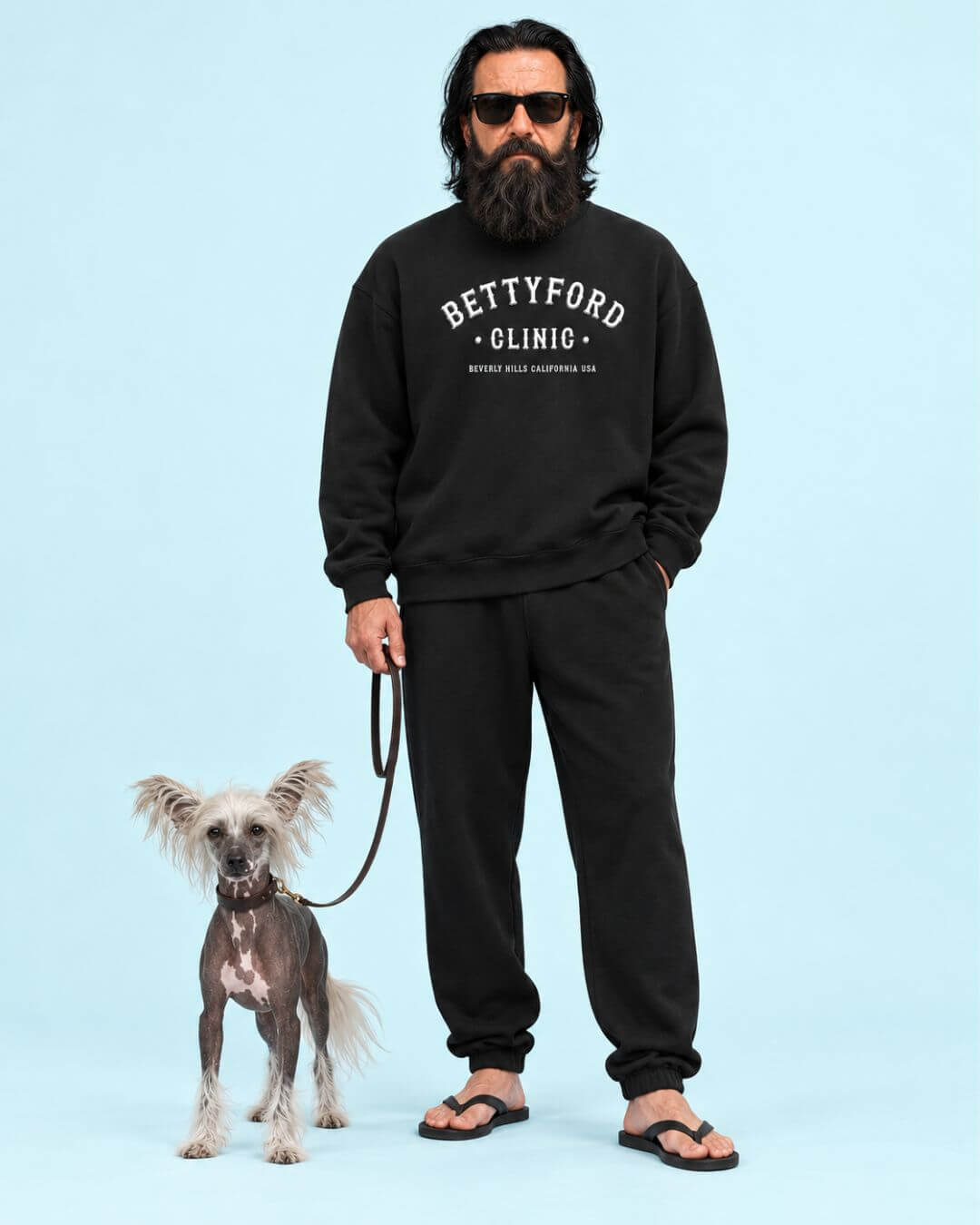 Walter and his dog Curly wearing the BINKY Betty Ford Clinic Heavy Sweater in Vintage Black with collegiate front graphic.