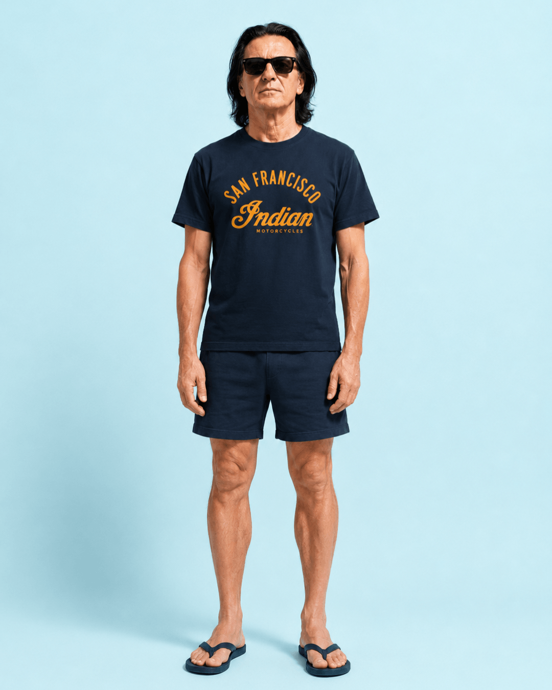 Bay Area Motorcycle T-Shirt | Road Club Classic worn by a model with sunglasses against a light blue background.