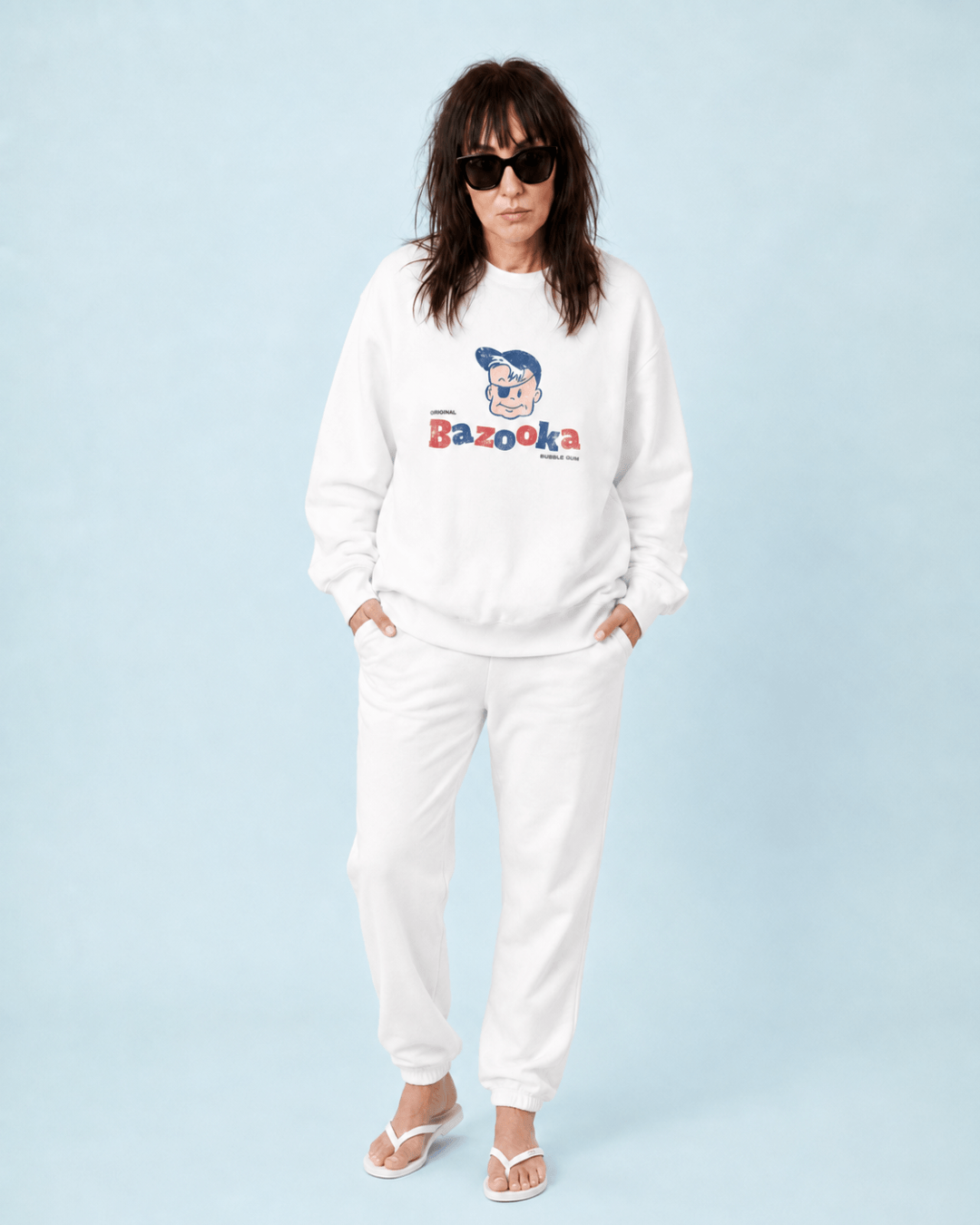 Bazooka Joe Club Heavy Sweater worn casually in white with a fun graphic design, perfect for nostalgic comfort.
