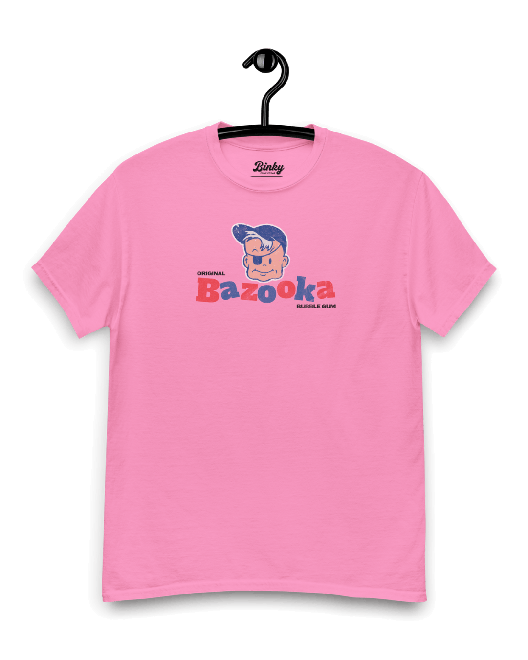 BAZOOKA JOE T-SHIRT | RETRO BUBBLEGUM LEGEND on a pink shirt showcasing the classic comic character.