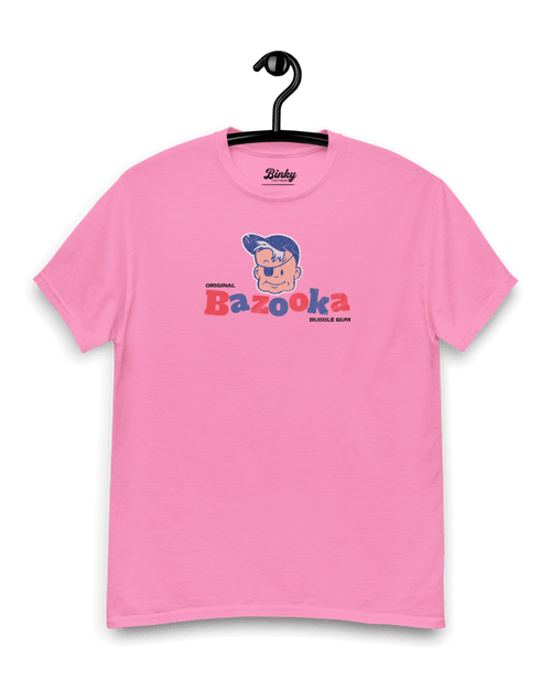 BAZOOKA JOE T-SHIRT | RETRO BUBBLEGUM LEGEND on a pink shirt showcasing the classic comic character.
