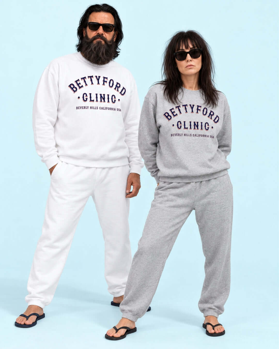 Walter in White and Helga in Sport Grey Betty Ford Clinic Soft Sweaters, posing together in the BINKY studio.