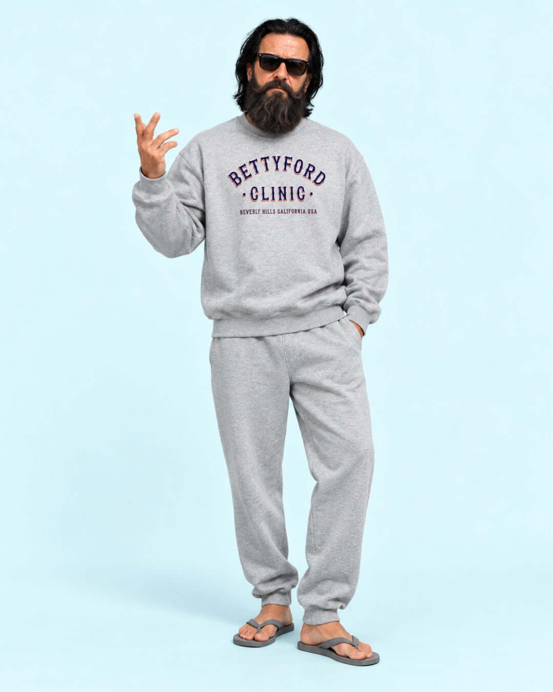 Walter wearing the BINKY Betty Ford Clinic RWB Heavy Sweater with red, white and navy varsity graphic.