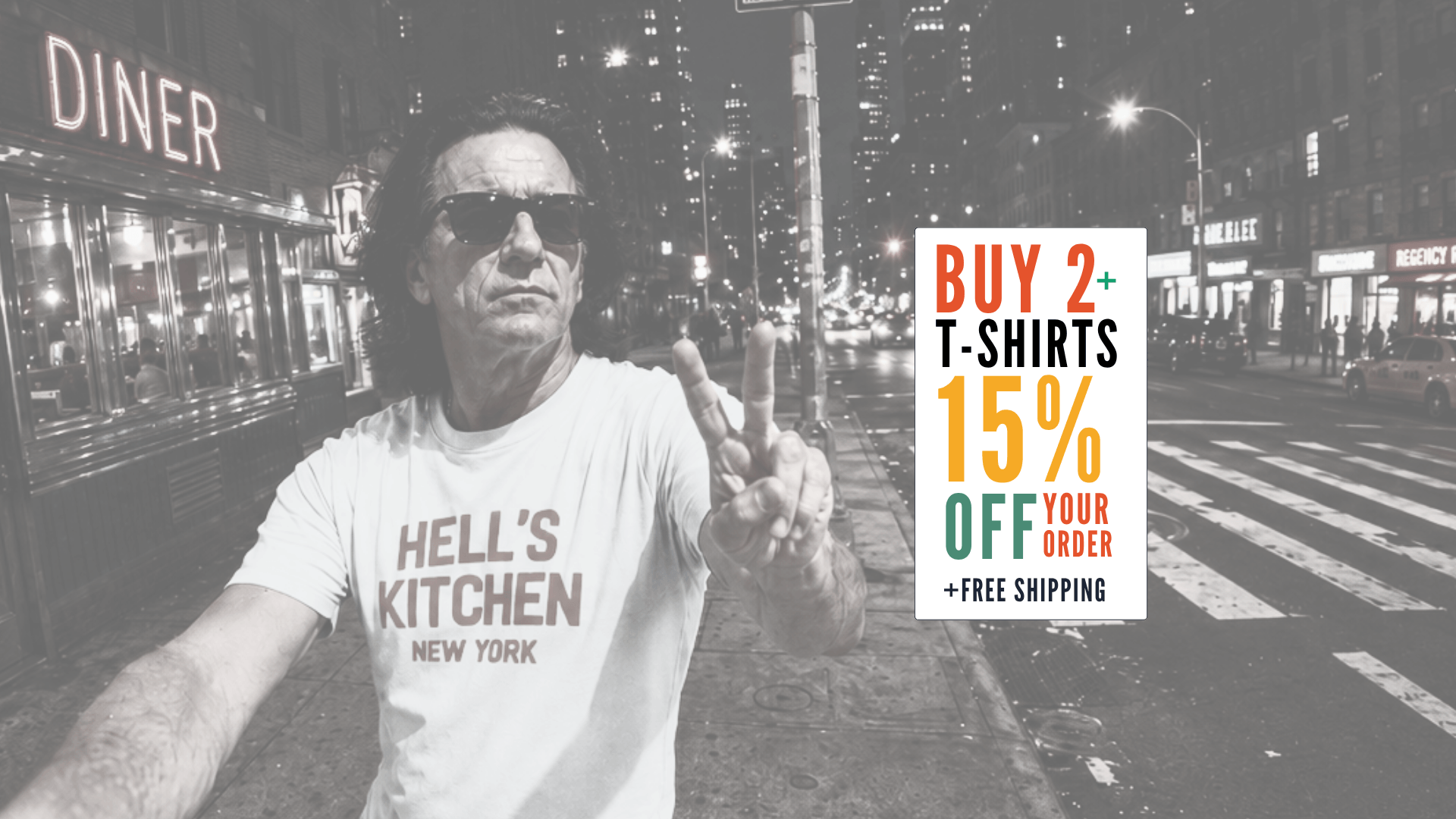 Man wearing a 'Hell's Kitchen' t-shirt promoting buy 2+ t-shirts for 15% off and free shipping.