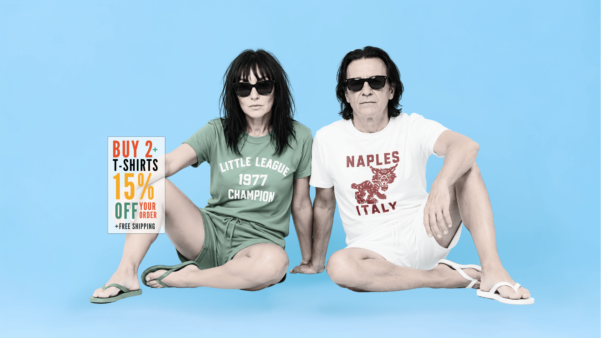Couple in stylish t-shirts promoting buy 2 get 15% off with free shipping on a blue background.