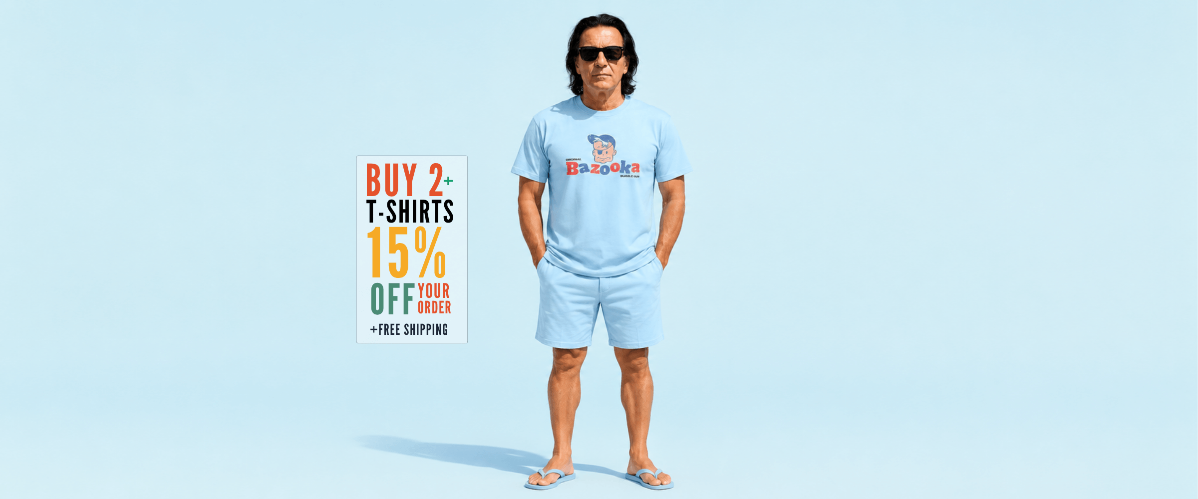 Man wearing light blue t-shirt and shorts promoting 15% off when buying 2 t-shirts, with free shipping.