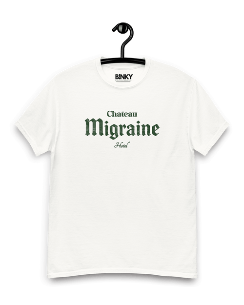 CHATEAU MIGRAINE T-SHIRT displayed on a hanger, showcasing its vintage wine-inspired design and relaxed fit.