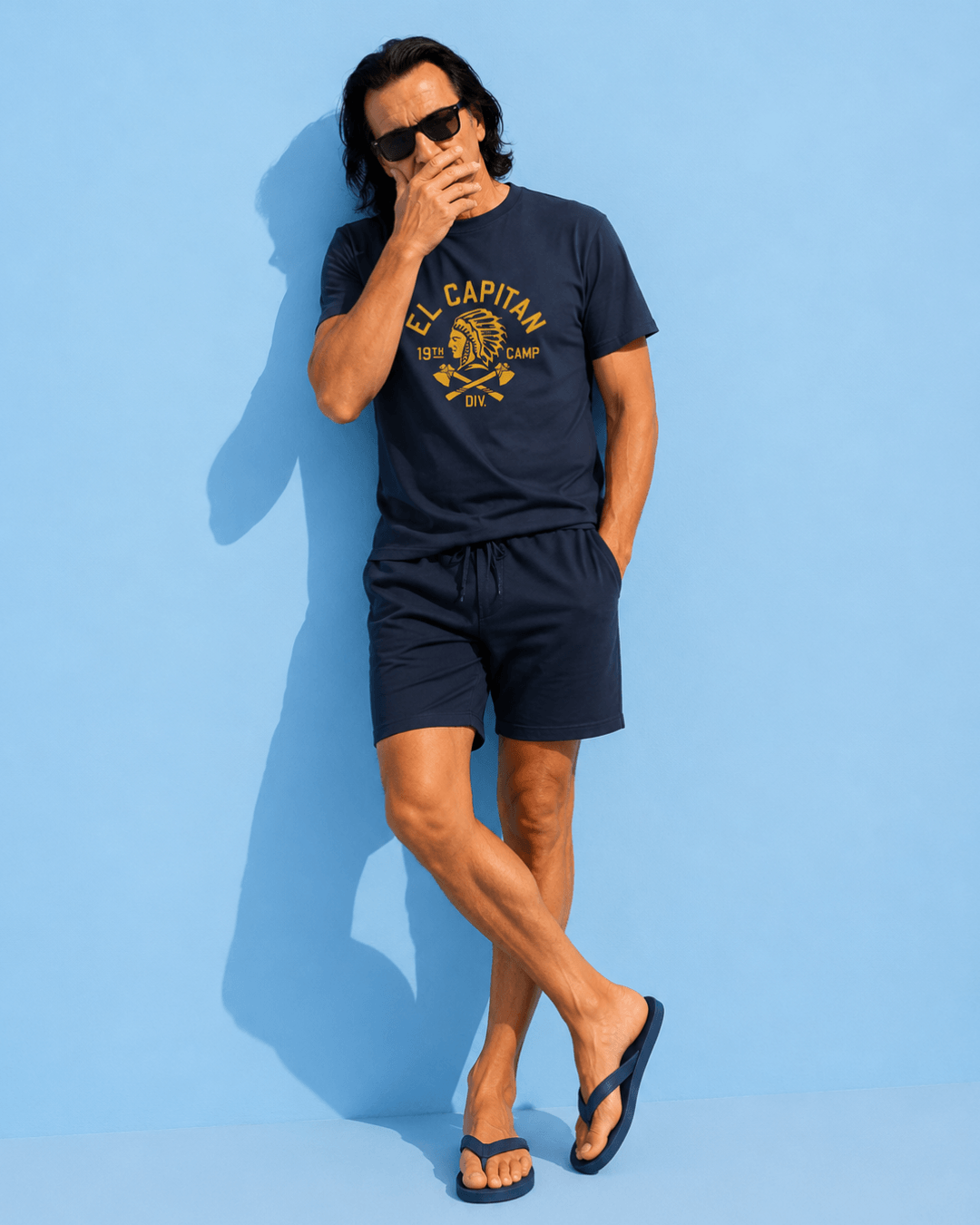 Model wearing El Capitan T-Shirt | Raw Vintage Ink against a blue background, showcasing American vintage retro design.