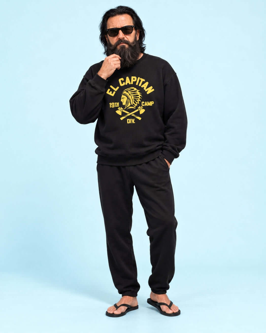 Walter wearing the black BINKY El Capitan Heavy Sweater with yellow graphic