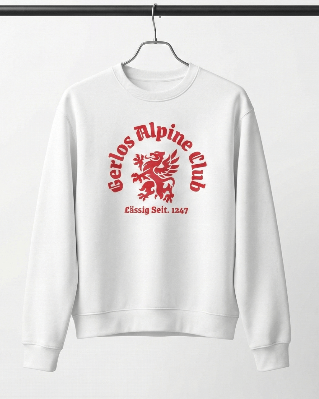 GERLOS ALPINE CLUB HEAVY SWEATER featuring bold griffin crest design in red on white fabric, perfect for winter wear.