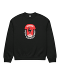 Hotel Kitzbühel Heavy Sweater featuring vintage hotel crest on a black oversized sweater.