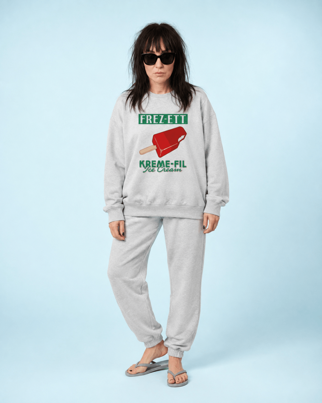 Ice Cream Heavy Sweater worn by a model, featuring a vintage ice cream graphic in a casual setting.