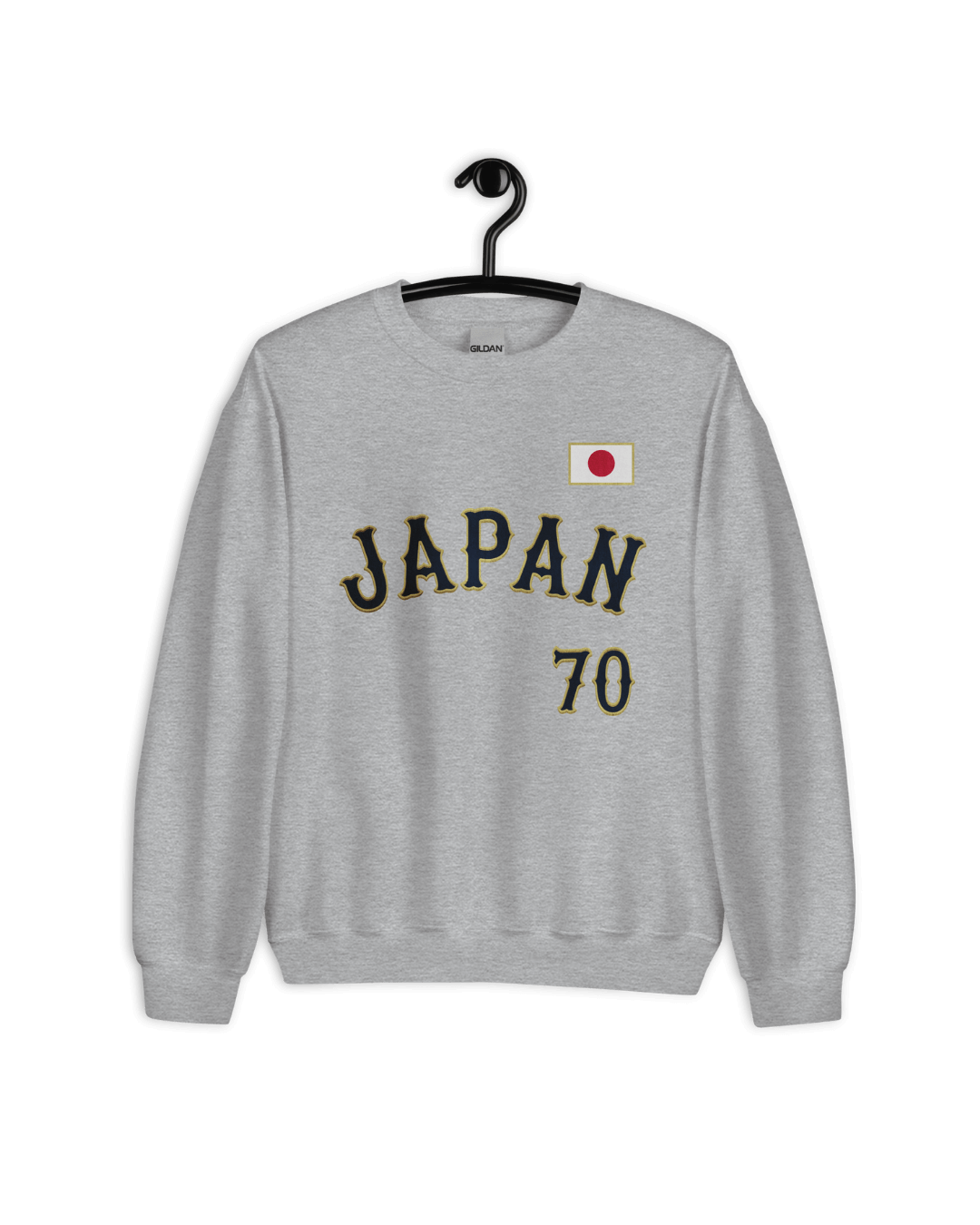 JAPAN 70 BASEBALL SWEATER displayed on a hanger, featuring a vintage design and ultra-soft interior.