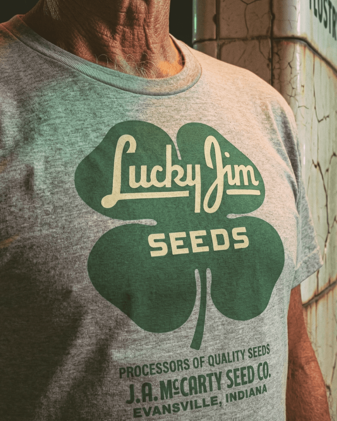 LUCKY JIM SEEDS T-SHIRT | HERITAGE WORKWEAR featuring a vintage design of clover and seed company logo.