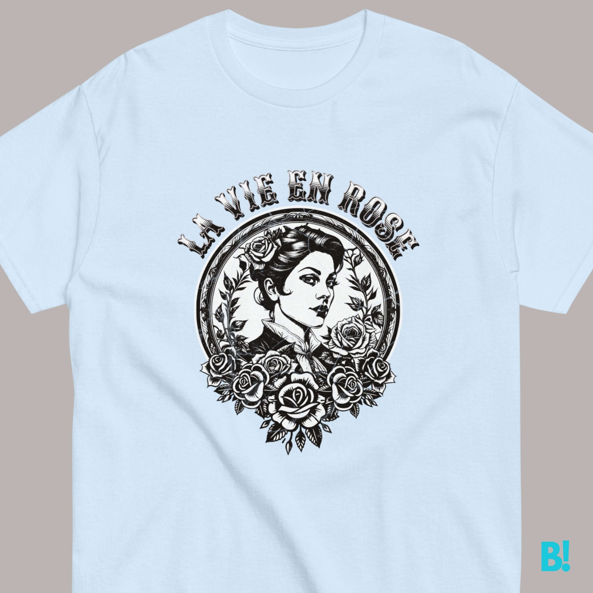 La Vie En Rose French Tattoo Retro Inspired Vintage T-Shirt Bonjour, romantics! La Vie en Rose, where every moment blooms with French romance. This enchanting tee captures the essence of Parisian elegance. Embrace the beauty of life in full bloom and pain