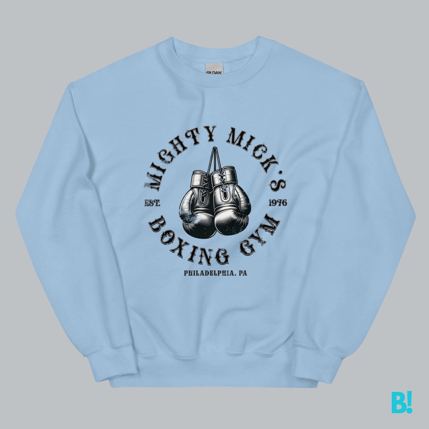 Light blue Mighty Mick's Boxing Gym sweater with vintage boxing gloves design, made from soft cotton blend for comfort and style.