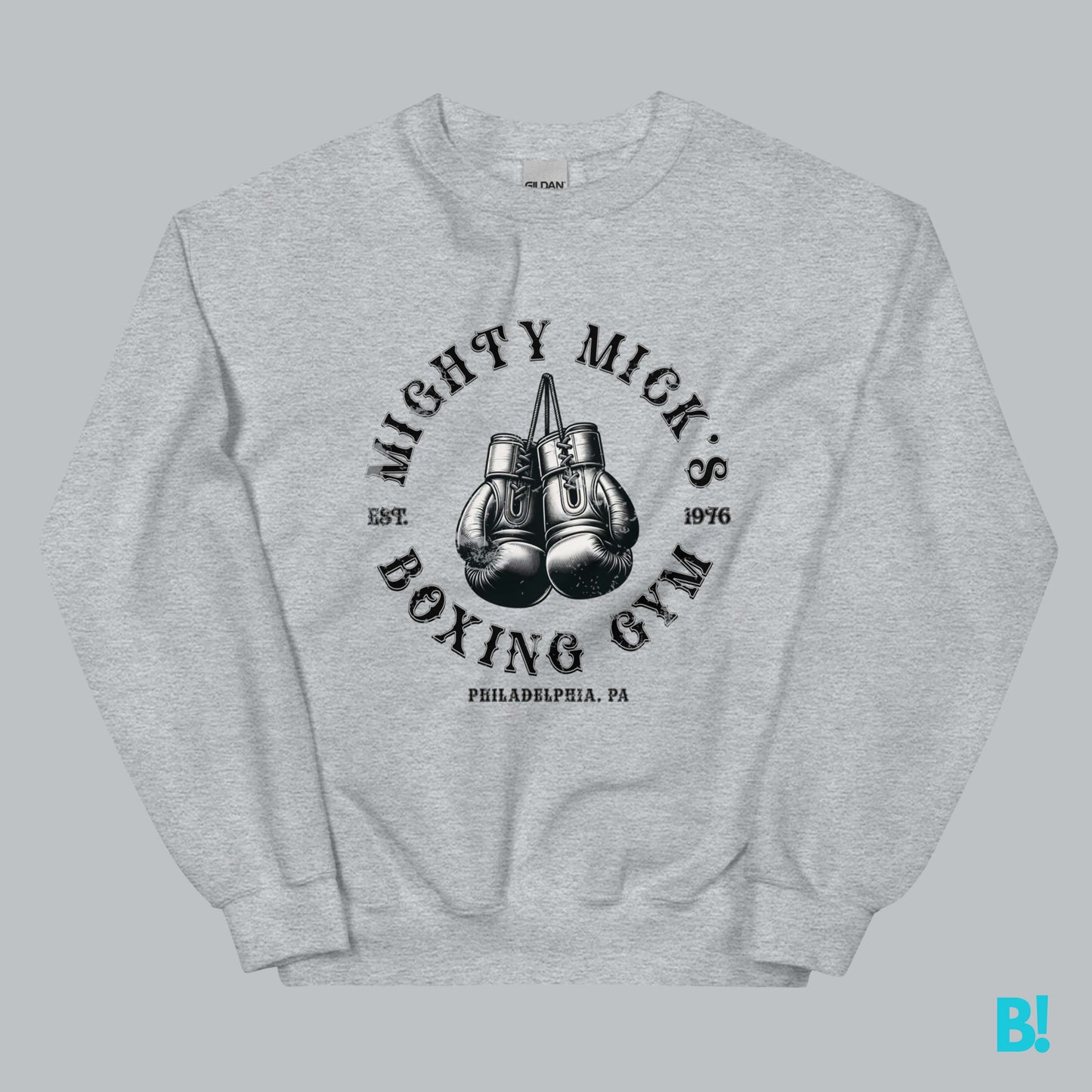 Mighty Mick's Boxing Gym sweater in grey with vintage boxing gloves design, perfect for fans of classic sports style and Rocky nostalgia.