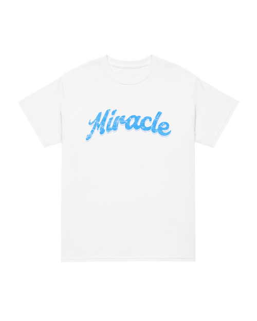 MIRACLE T-SHIRT | LUCK IS EARNED - White tee with blue 'Miracle' text design.
