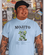 Model wearing a MOJITO COCKTAIL T-SHIRT in light blue, showcasing organic cotton comfort and stylish print.