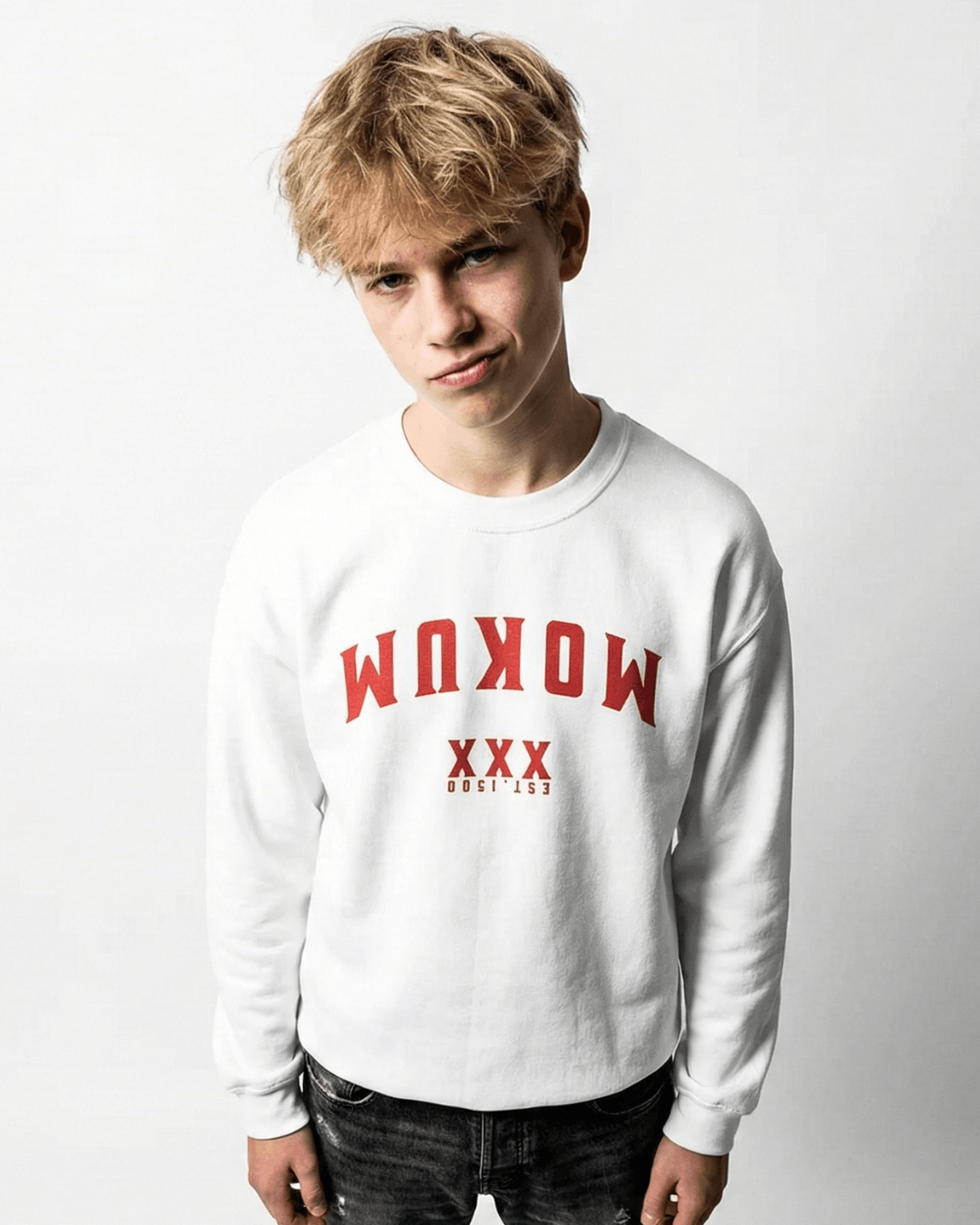 Amsterdam Sweater | Mokum Est 1300 Edition worn by a young man in a stylish design.