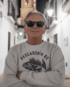 Person wearing a PESCADERIA SWEATER in Alhaurín el Grande, Málaga, Spain with a charming street background.