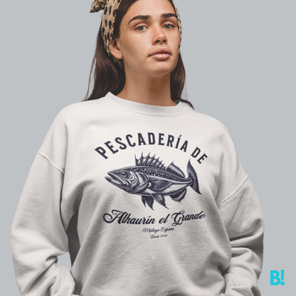 Classic "Pescadería" Sweater by DEPUIS 1970 Wrap yourself in comfort with the timeless "Pescadería de Alhaurin" Sweater. Made from a 50/50 blend of pre-shrunk Cotton & Polyester for a soft & perfect fit. €39.0 B!NKY Comfywear