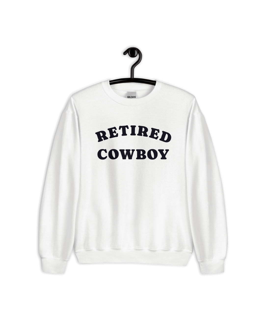 RETIRED COWBOY SWEATER displayed on a hanger, showcasing its bold text and cozy white design.