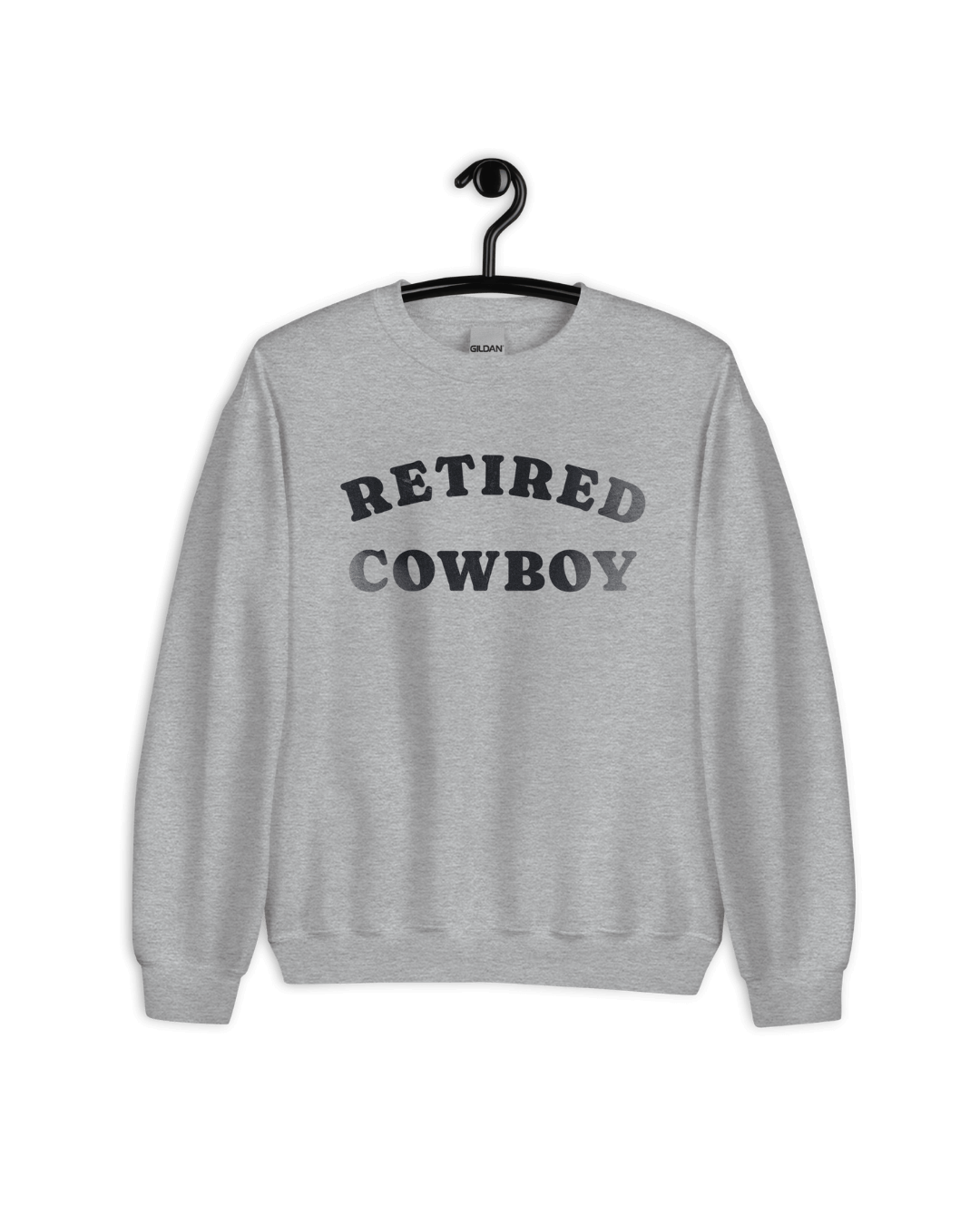 Retired Cowboy Sweater displayed on a hanger, featuring a comfy design and ultra-soft interior for relaxed wear.