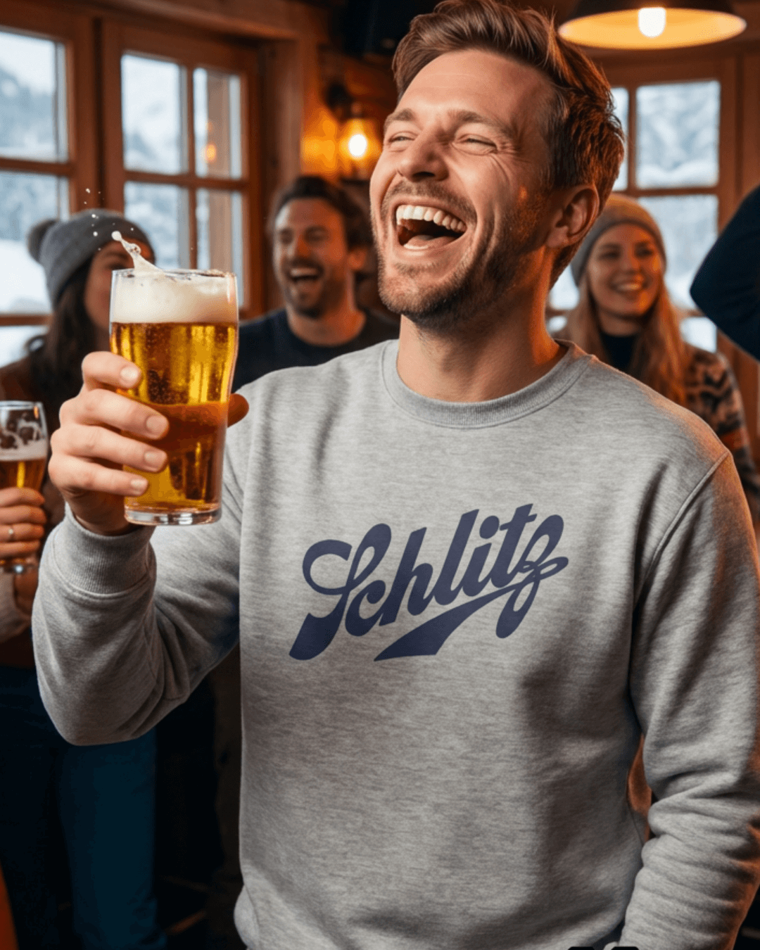 Man enjoying a drink wearing a SCHLITZ HEAVY SWEATER in a lively setting.