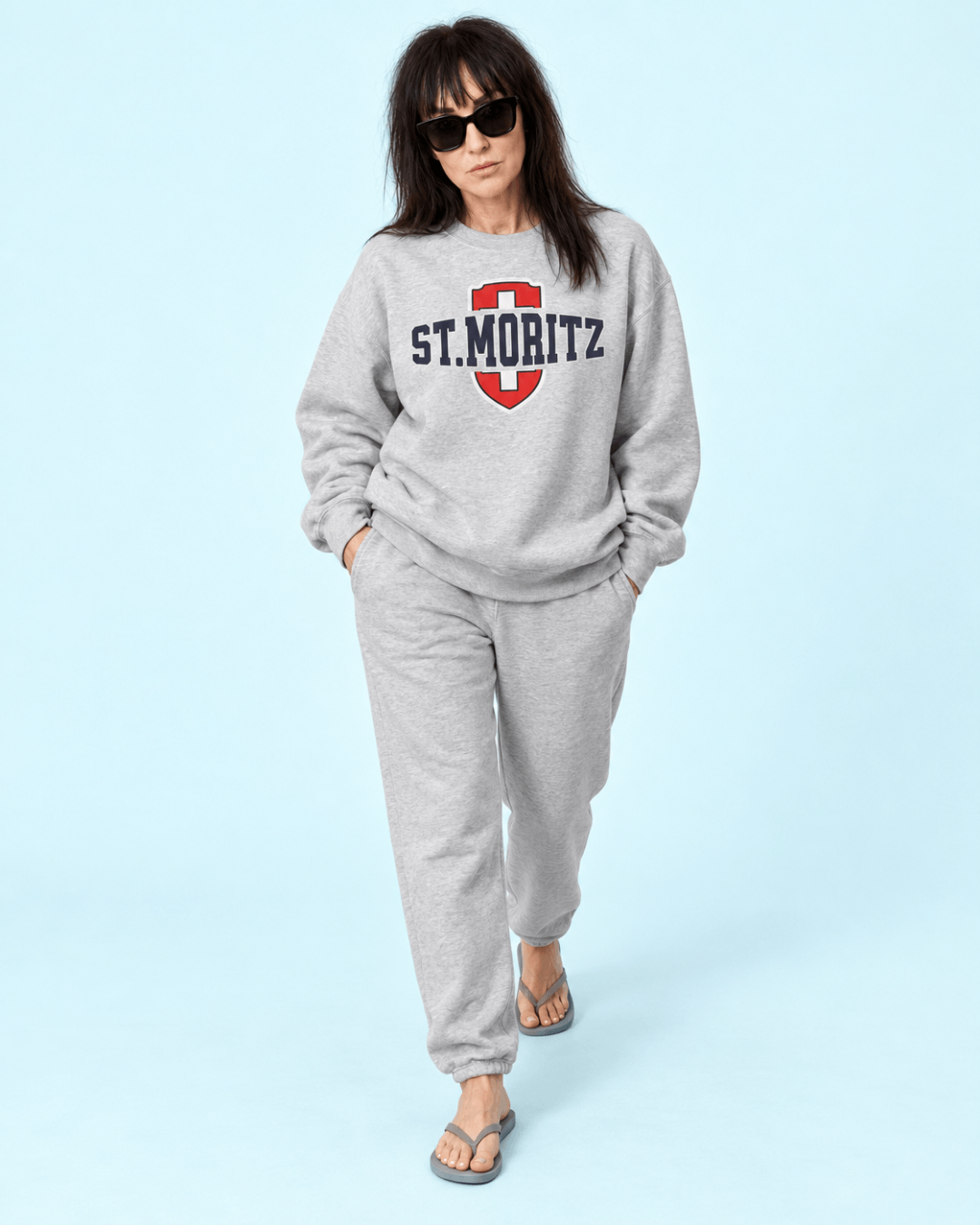 Woman wearing a St. Moritz Heavy Sweater and sweatpants, styled in a modern oversized look.