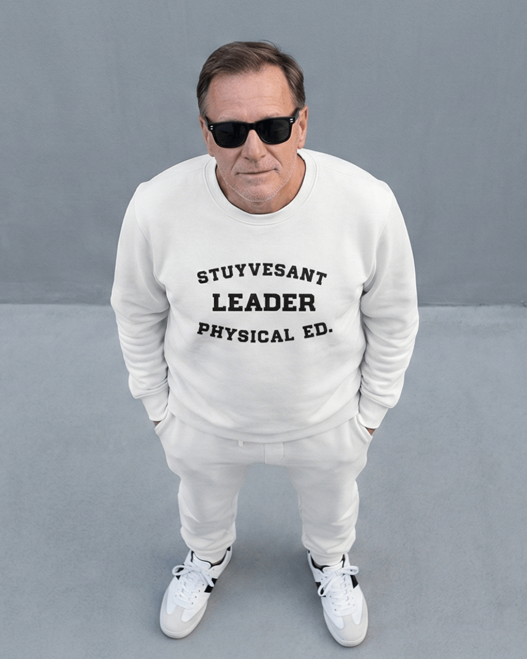 Man wearing STUYVESANT LEADER HEAVY SWEATER with sunglasses, showcasing urban style and comfort.