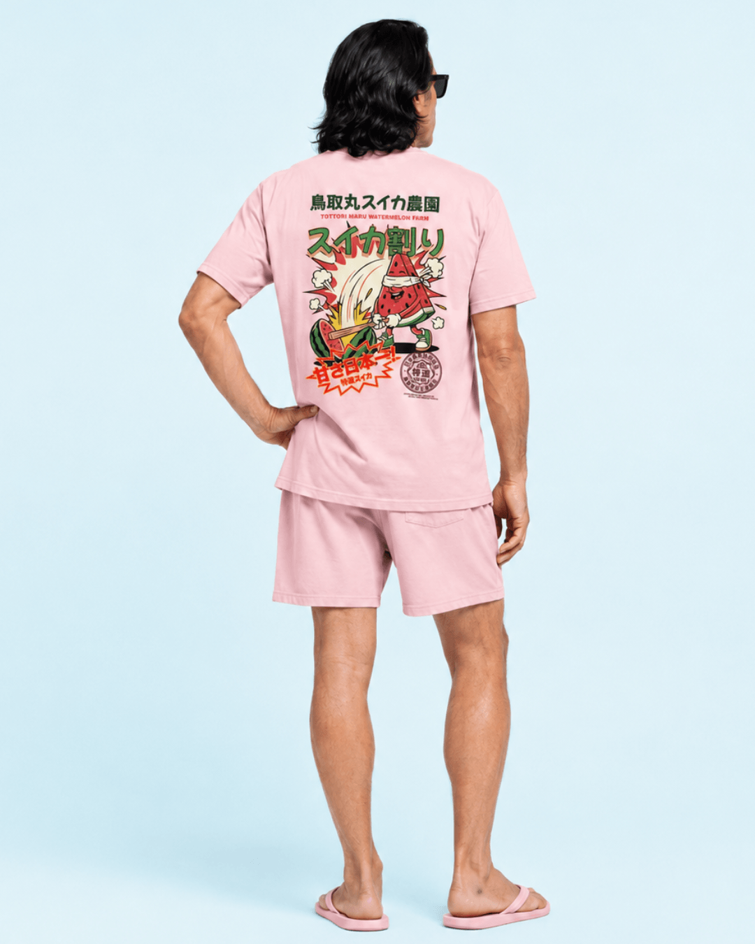 Suikawari Festival T-Shirt | Summer Chaos featuring a playful graphic on a pink tee, perfect for summer fun.